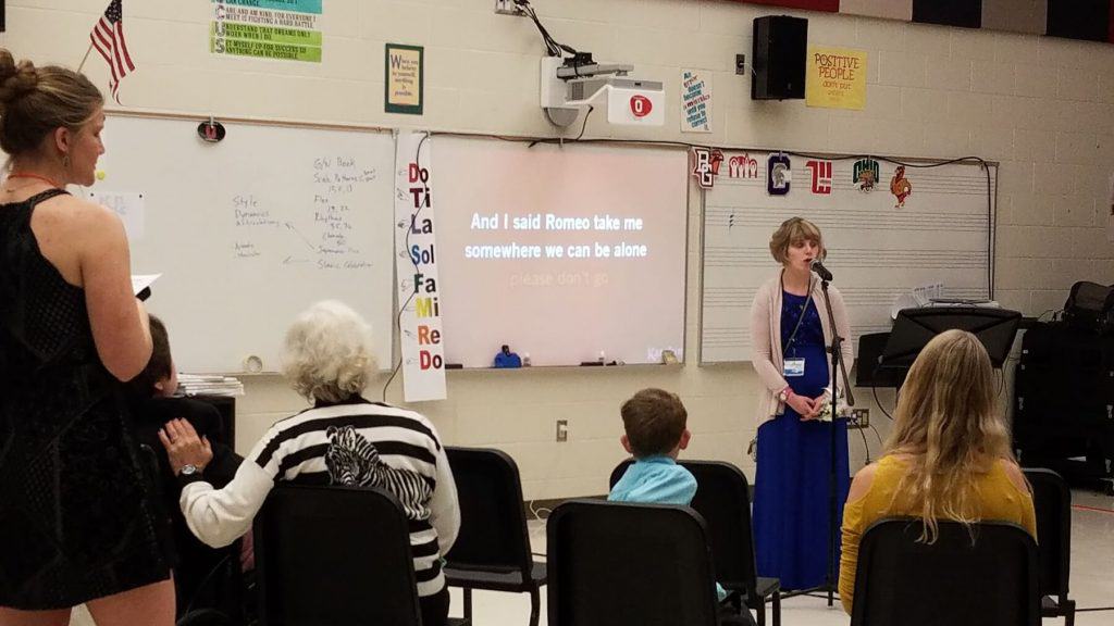 Prom Guests Watch as Karaoke Singer Performs