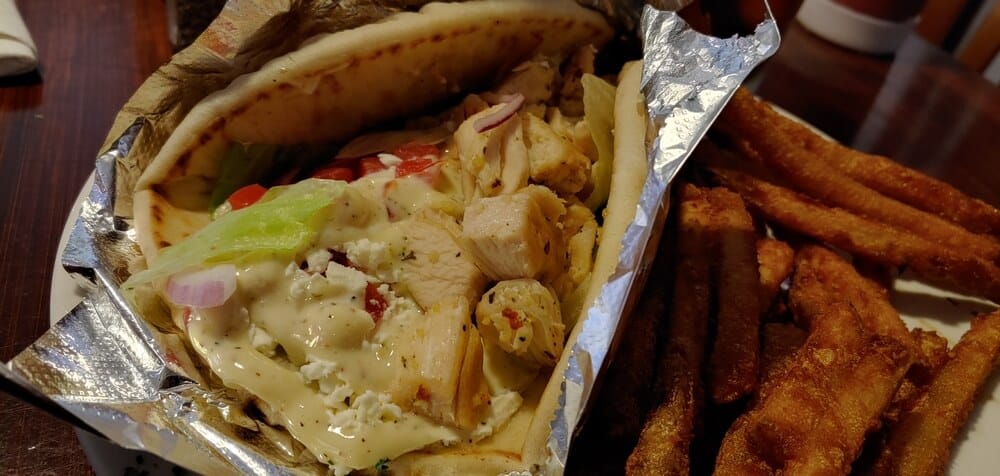 Grilled Chicken Gyro with a side of Seasoned Fries