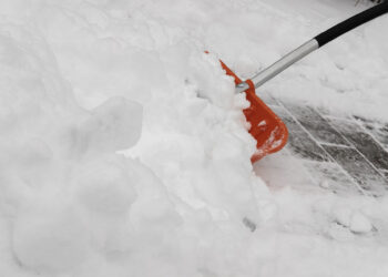 Snow will better slide off a shovel doing this