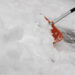 Snow will better slide off a shovel doing this
